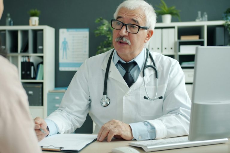Comparing Medicare Advantage Network Restrictions and Traditional Medicare Part B Coverage senior healthcare medicare doctor consultation stethoscope elderly wellness