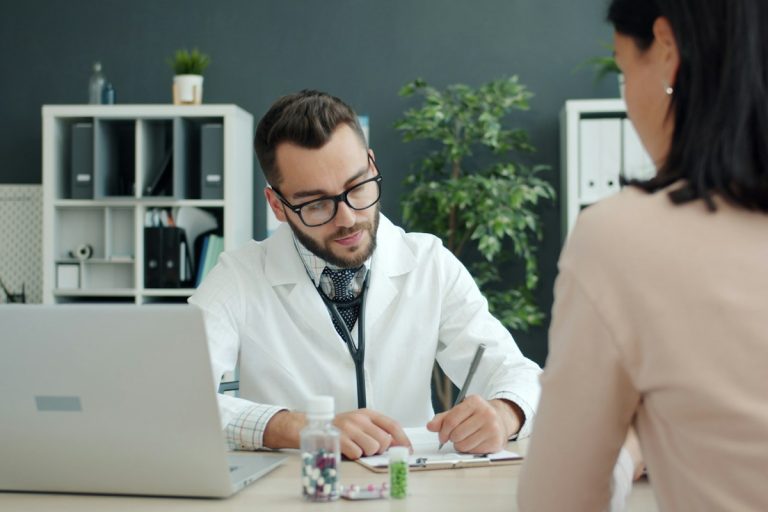 Evaluating Critical Illness Insurance Riders, Lump-Sum Payout Triggers, and Policy Limitations doctor consulting patient hospital specialist medical clinical care