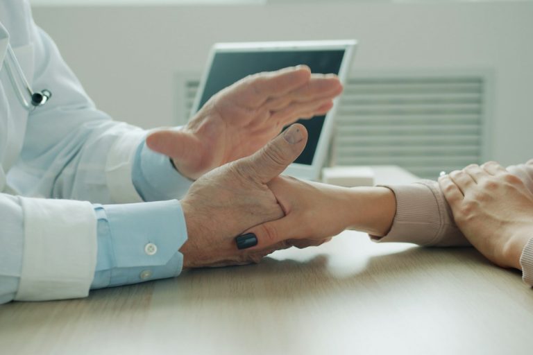 Navigating Health Insurance Subrogation Liens, Third-Party Liability Settlements, and Make-Whole Doctrines attorney reviewing legal medical settlement documents courtroom desk
