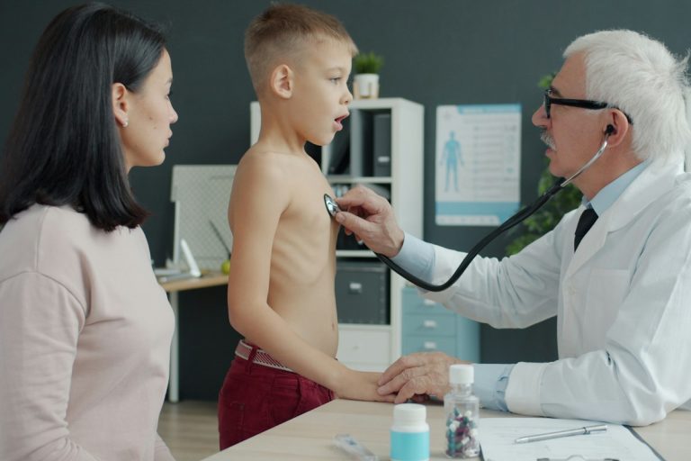 pediatric doctor examination child immunization family wellness clinic