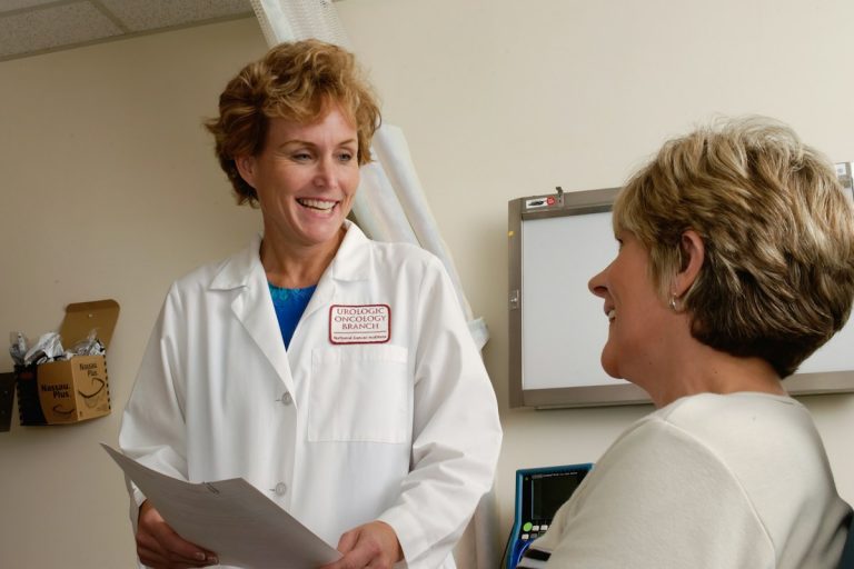 Resolving Surprise Medical Bills and Out-of-Network Balance Disputes Under the No Surprises Act patient reviewing emergency medical hospital invoice billing financial consultation